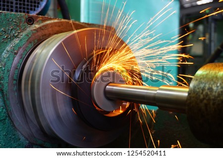 Production of parts in the metalworking industry, finishing on an internal steel surface grinding machine with flying sparks