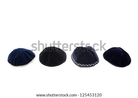 A kippah is a small cap (head covering), is a thin, slightly-rounded skullcap traditionally worn by observant Jewish men. Royalty-Free Stock Photo #125453120