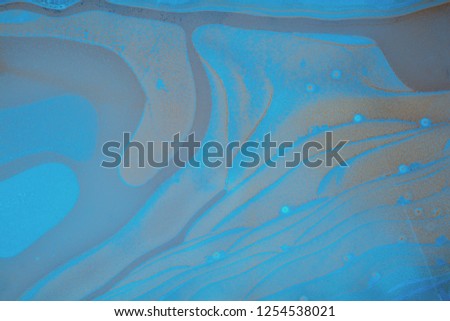 Natural abstract pattern on frozen puddle. Nature background