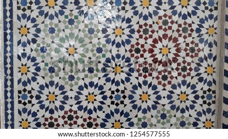 Oriental Moroccan tile pattern. Moroccan mosaic tiles. Colorful geometric symmetry, spiritual zen, beautiful architecture. Fez, Morocco.