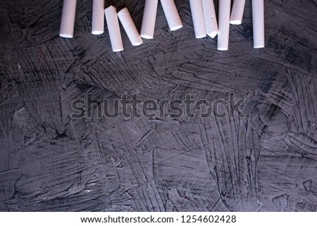 White chalk for school on gray background
