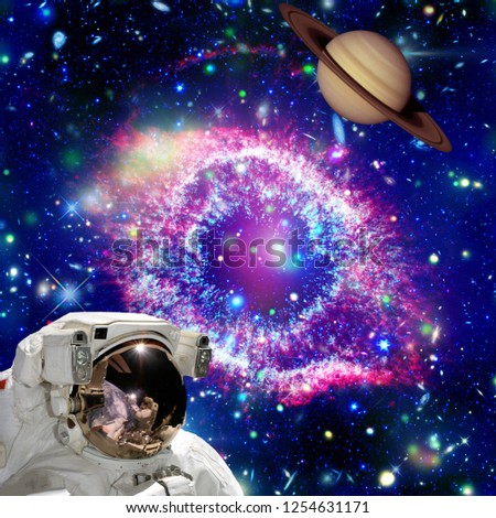 Astronaut looking at the planet against space. The elements of this image furnished by NASA.