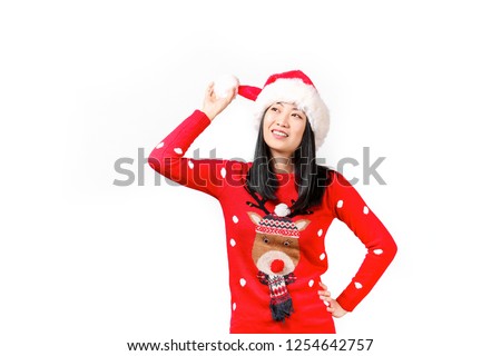 Beautiful smiling asian woman wearing knitted sweater celebrating Christmas. Attractive brunette casual female, new years eve. Ugly Christmas sweater concept. Background, copy space, close up portrait