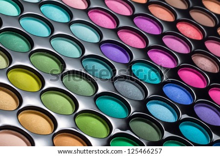 Colorful eye shadows palette. Makeup background. Colorful make-up palette Royalty-Free Stock Photo #125466257
