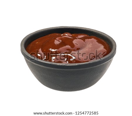 English brown sauce isolated on white background. Barbecue sauce on white background Royalty-Free Stock Photo #1254772585