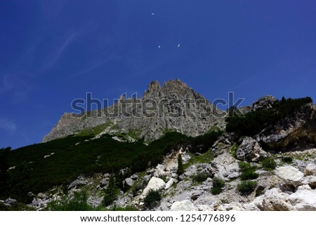 Summer view of Sella Towers and Piz Boè from Passo Pordoi, Canazei, Dolomites, Italy