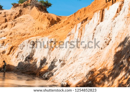 Fairy Stream Canyon, The muddy waters of the Fairy River (Suoi Tien) with red river, Tropical oasis scenery of hills with limestone, sandstone plateaux. Popular and famous landmark of Mui Ne, Vietnam
