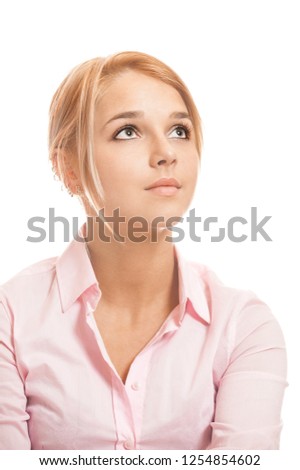 Beautiful blonde young woman in pink shirt close-up, isolated on white background.