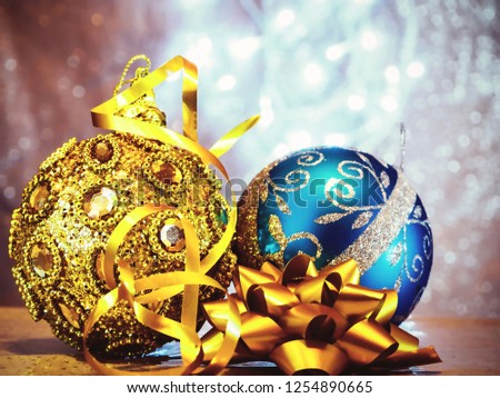 Christmas tree toys with blurred, sparkling, Light and fairy background. Fir tree decoration. New Year 2019. New Year mood,  Lights, bokeh. festive. Merry Christmas concept. Copy space for design.