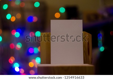 Christmas mock up greeting card or New Year  on vintage wood  on night  bokeh background