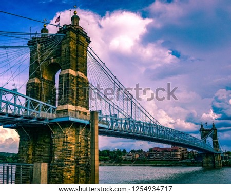 Cincinnati bridge with blue skies in the background.