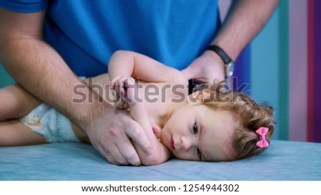 An occupation with baby with cerebral palsy. Physiotherapy Royalty-Free Stock Photo #1254944302