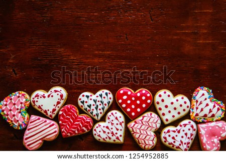 Heart shaped cookies icing on wood background for Valentine's day delicious homemade natural pastry, baking with love for Valentine's day, love concept