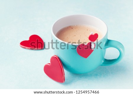 Cup of coffee and hearts for Valentines day breakfast.