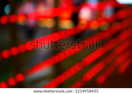 red bokeh in black background,city night,space flare,blurry traffic background,abstrac line