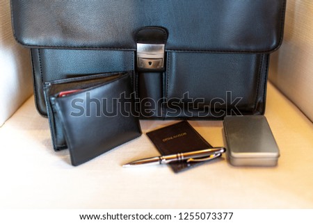 Leather lawyer bag with wallet, pen and patent badge of admission to the bar. Ordine avvocati means patent of admission to the bar