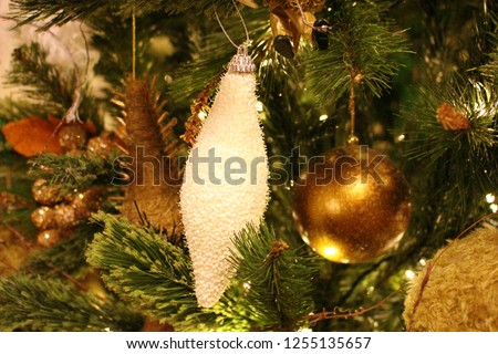 White Ornament on Christmas Tree