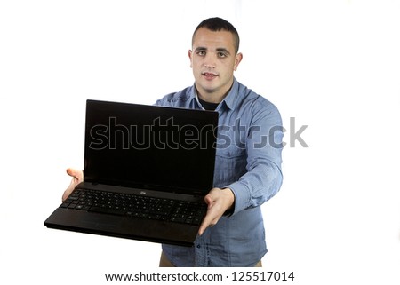 Young man with laptop in hands on white background