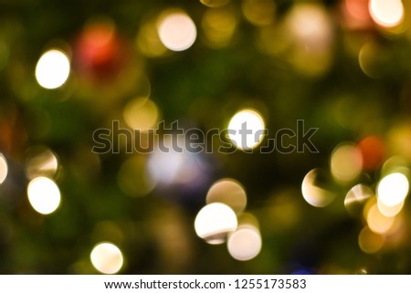 Bokeh of Christmas lights. Holiday abstract glitter background.