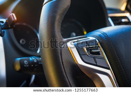 Multifunction Steering Wheel . Switch Button Audio Volume Media Control Switch Button of luxury car Royalty-Free Stock Photo #1255177663