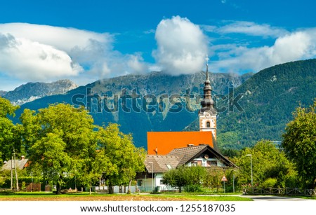 St. Andrew Church in Mosnje village - Radovljica, Slovenia Royalty-Free Stock Photo #1255187035