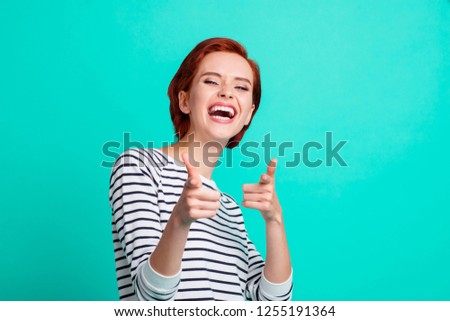 Portrait of nice pretty attractive cheerful cheery red-haired lady wearing striped pullover pointing forefingers mockery isolated over bright vivid shine green turquoise background