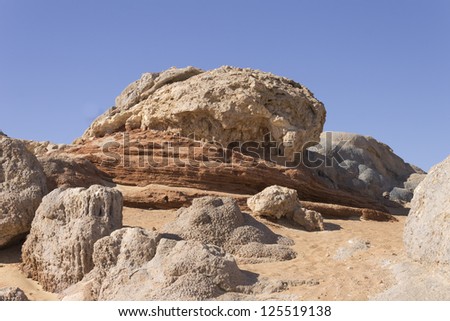 Rock formations from alabaster in White desert, Oasis area, Egypt Royalty-Free Stock Photo #125519138