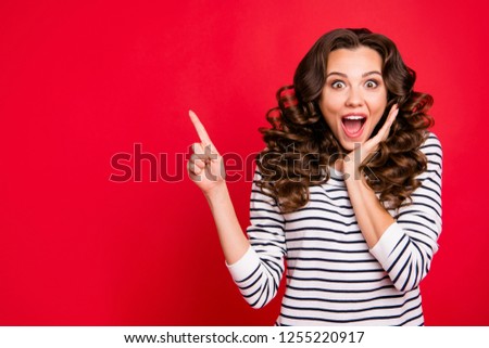 Close up photo of attractive pretty beautiful she her lady finger up to empty space wondered if to buy buyer shirt ask advise wearing white striped pullover isolated on red vivid background