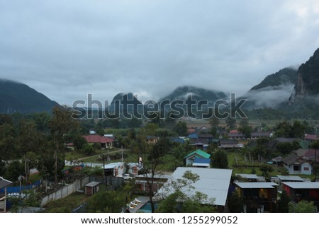 Morning mist over mountains in Vang Vieng, Laos.