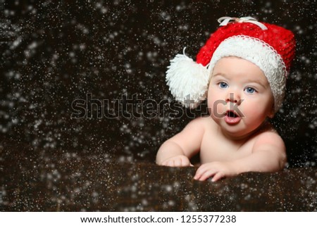 Christmas portrait of cute little newborn baby 