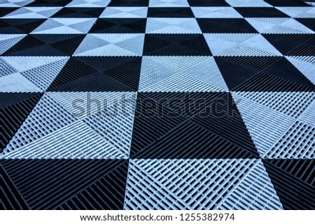 Textured chess board background. Checkered black and white tile pattern, black and white background 