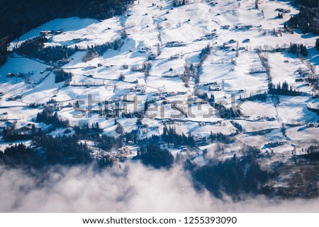Austrian village situated on a hills. Winter scenery
