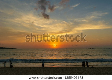 Sunset in Jimbaran beach Bali, beautiful bali, setting sun and the beach- a panoramic view