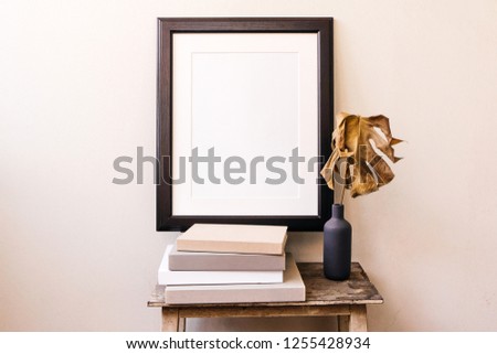 Empty wooden frame mockup. Interior poster design on white wall