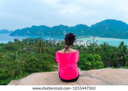 happy young cute girl relaxing woman resting women hipster guiding 
female travelling planning stuff long weekend idea at beautiful blue 
paradise tropical coast beach PP Island Krabi Phuket Thailand
