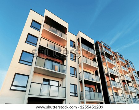 Apartment house and home residential building real estate concept. Place for copy space. With blue sky