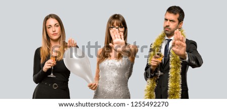 Group of people with champagne celebrating new year 2019 making stop gesture denying a situation that thinks wrong