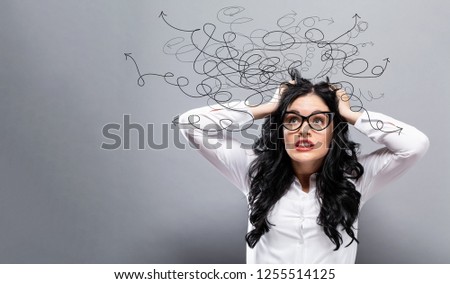 Solving a problem concept with young business woman feeling stressed