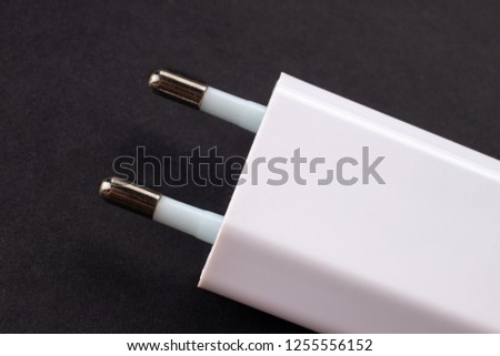 White usb charge on a dark background