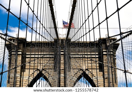 Brooklyn Bridge with the American Flag, New York City, United State of America