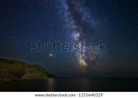 Ocean coast on the background of the Milky Way