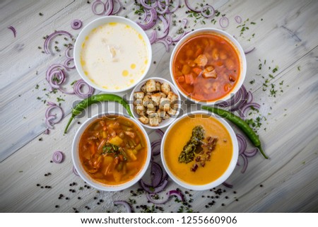 Mix soup in white bowl with wooden background