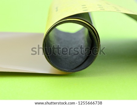 old vintage camera roll film on a green background,image of a