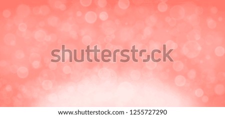 Bokeh on pink background.  Valentines day and love concept. Horizontal wide screen banner format. Living coral theme - color of the year 2019