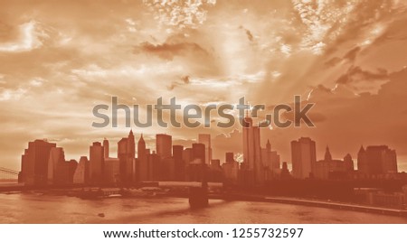 Manhattan Skyline orange color background