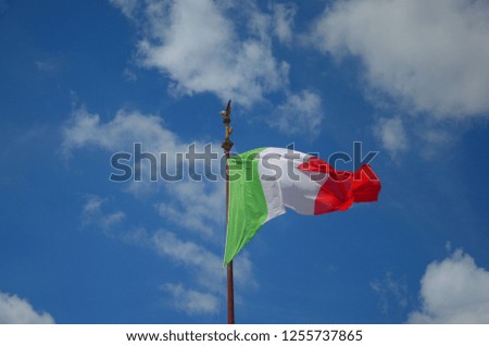 Italian flag in the Blue sky