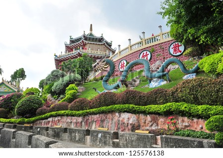 Pagoda and dragon sculpture of the Taoist Temple in Cebu Royalty-Free Stock Photo #125576138