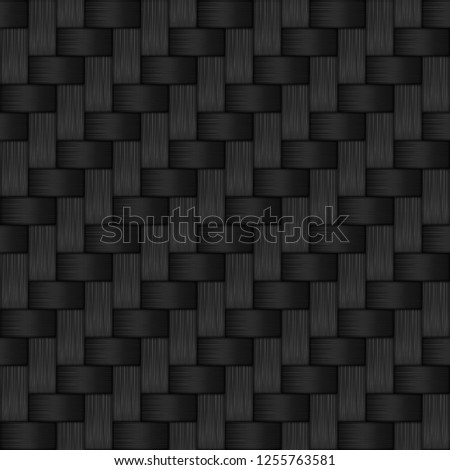 Abstract seamless background of black carbon fiber texture.