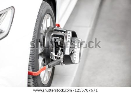 Professional tool for wheel alignment on the car disk during the work