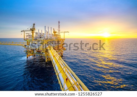 Offshore oil and gas rig platform with beautiful sky in the gulf of Thailand. Royalty-Free Stock Photo #1255826527
